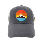 Gray baseball cap with a circular retro mountain-and-sunset logo embroidered on the front.